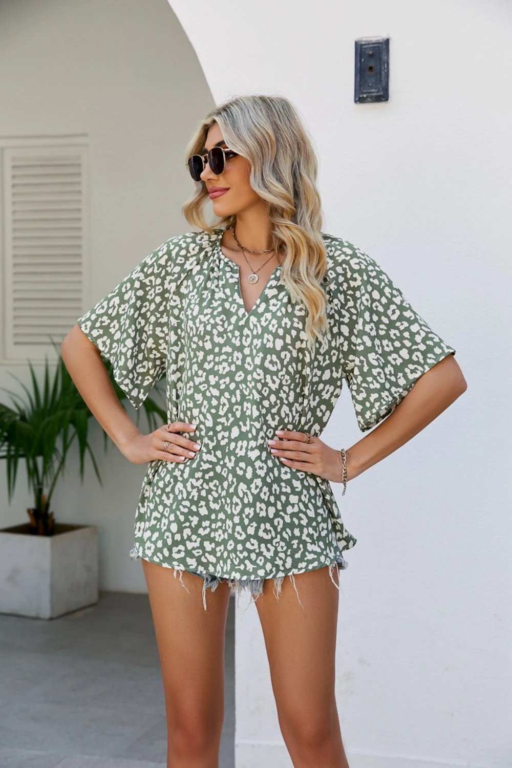 Leopard Notched Half Sleeve Blouse - Trendsi - Flyclothing LLC