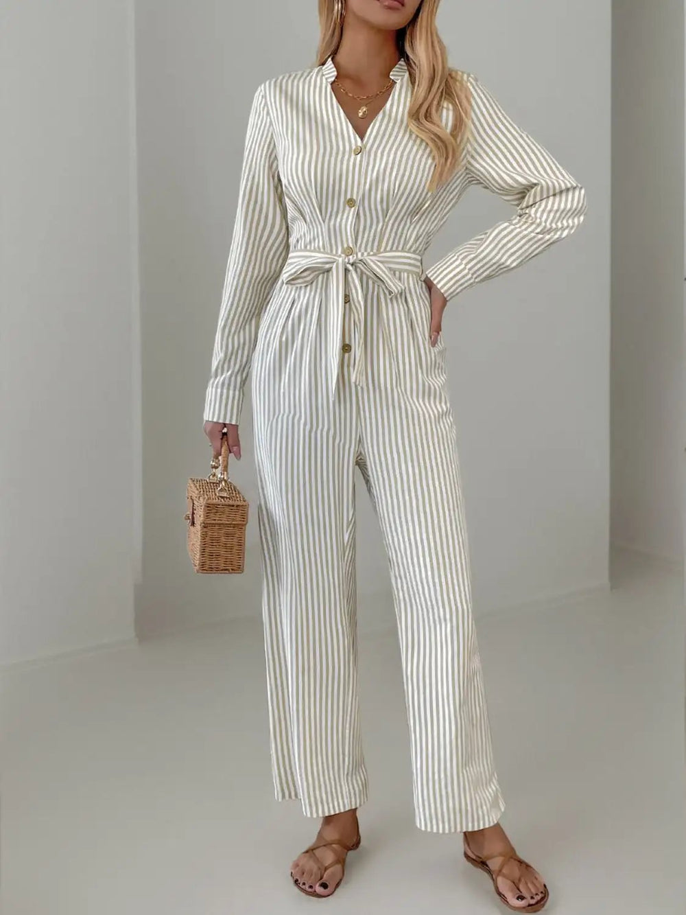 Striped Notched Long Sleeve Tie Waist Jumpsuit - Trendsi