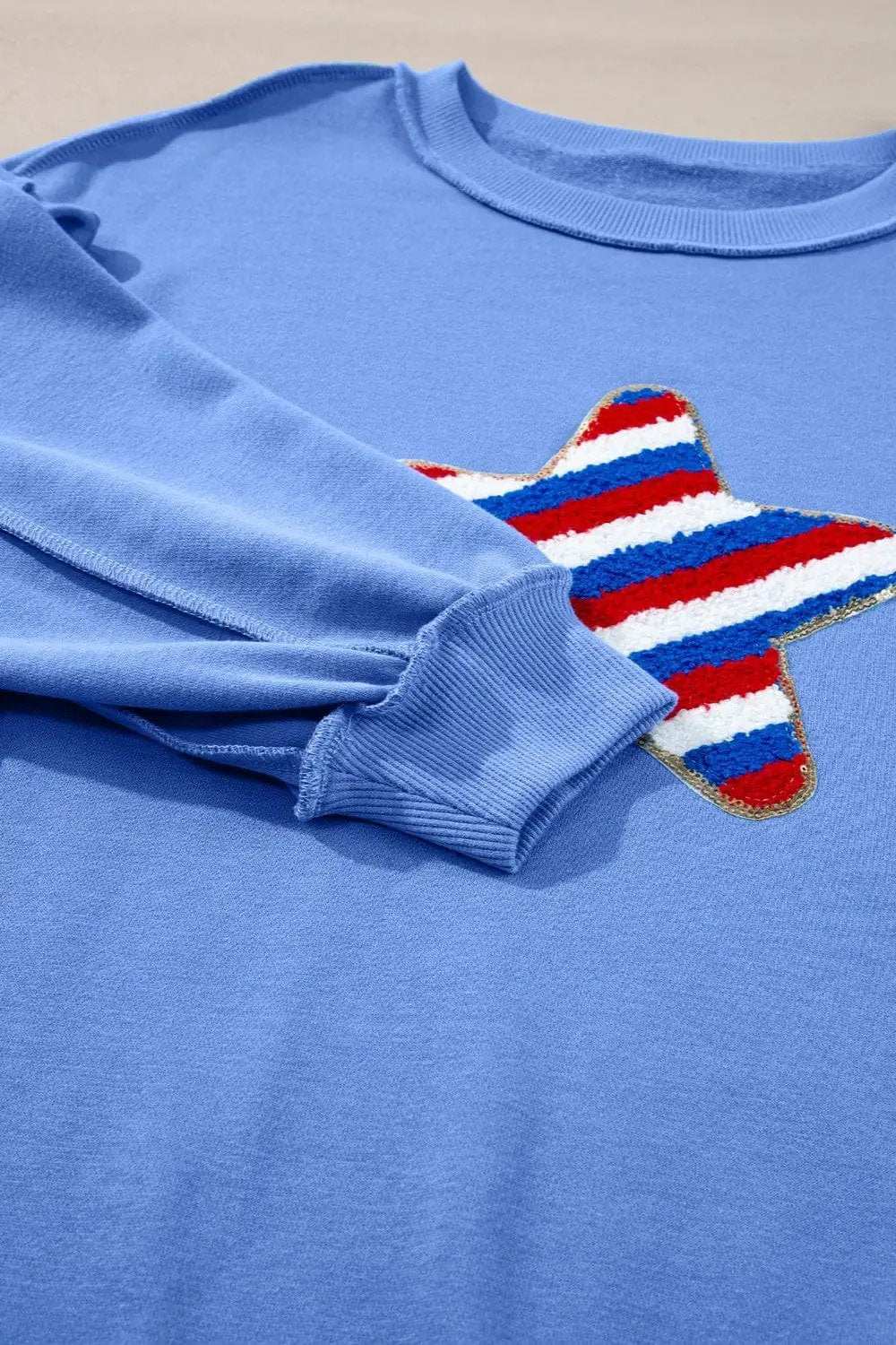 Exposed Seam Star Long Sleeve Sweatshirt - Trendsi - Flyclothing LLC