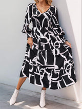 Perfee Smocked Printed Long Sleeve Midi Dress - Trendsi - Flyclothing LLC