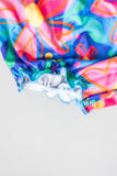 Springing Around Ruffle Cross Back Romper - Mila & Rose ®