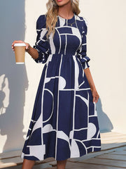 Vestido midi de manga larga con bloques de color fruncidos