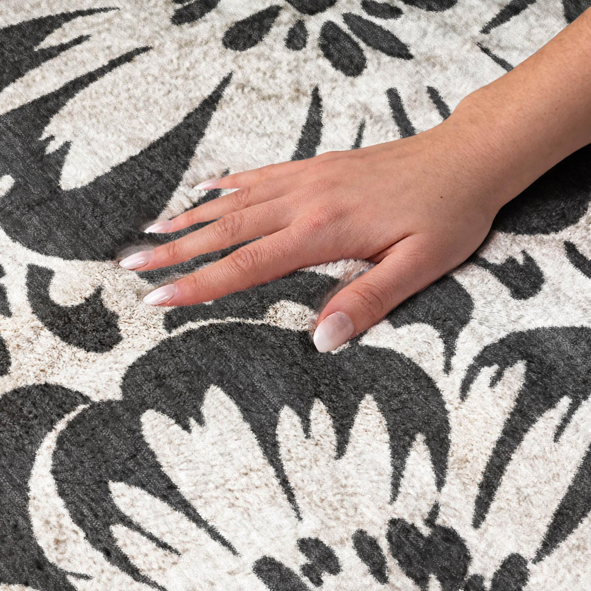 8' X 10' Black And Ivory Floral Shag Washable Area Rug With UV Protection - HomeRoots - Flyclothing LLC