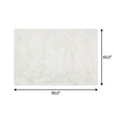 5' X 8' Green And Ivory Abstract Shag Washable Area Rug With UV Protection - HomeRoots - Flyclothing LLC
