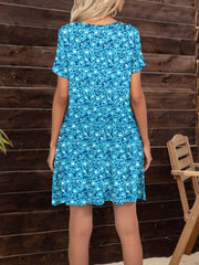 Pocketed Printed Round Neck Short Sleeve Mini Dress - Trendsi