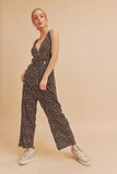 Aemi + Co Ditsy Floral Surplice Sleeveless Wide Leg Jumpsuit - Trendsi