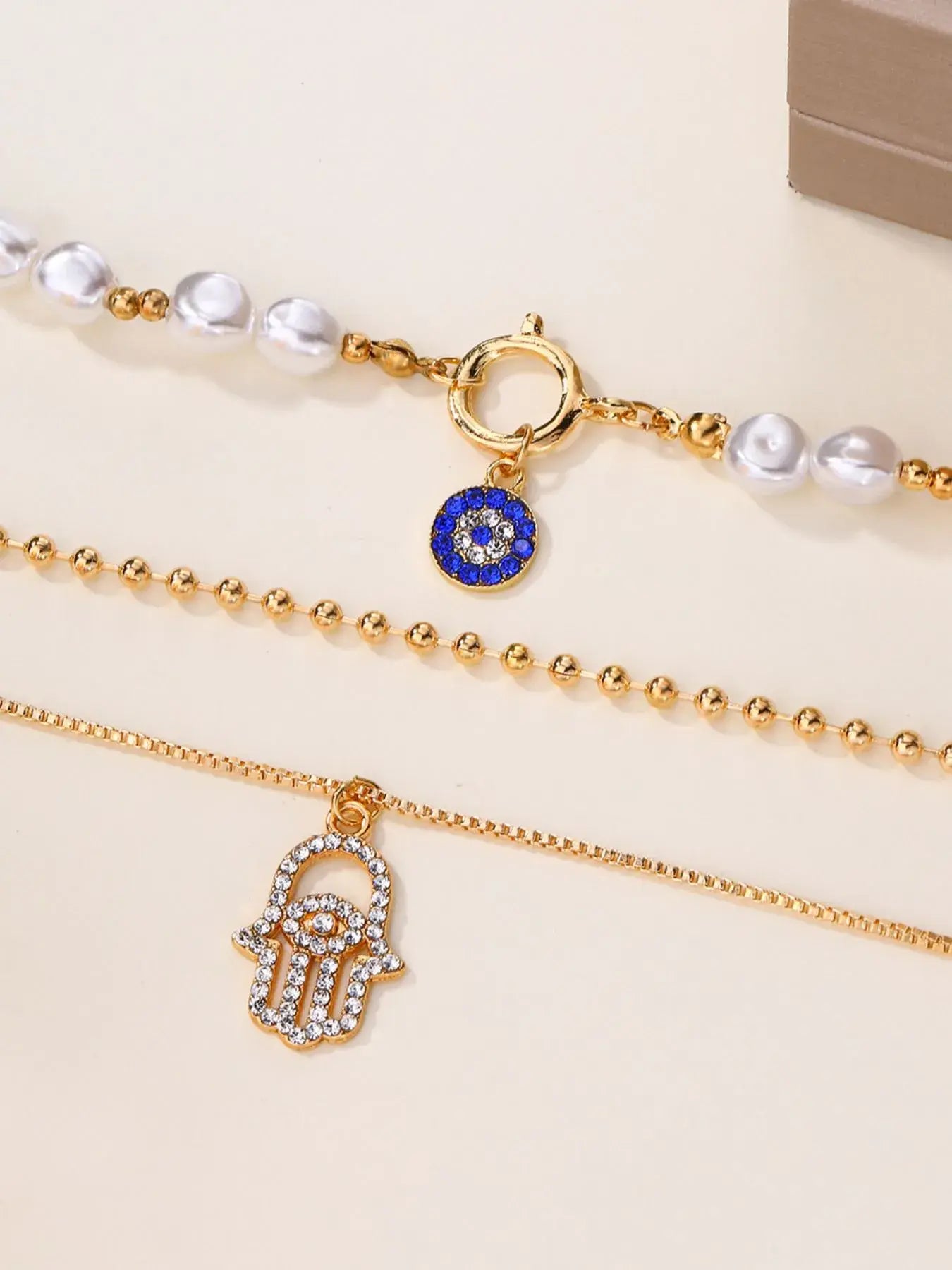 Layered Pearl Chain Evil Eye Hamsa Pendant Necklace - Trendsi - Flyclothing LLC