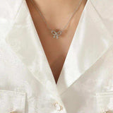 Titanium Steel Bow Pendant Necklace - Trendsi - Flyclothing LLC