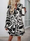 Perfee Ruffled Printed V-Neck Long Sleeve Dress - Trendsi