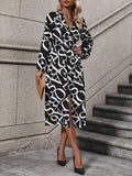 Printed V-Neck Long Sleeve Midi Dress - Trendsi