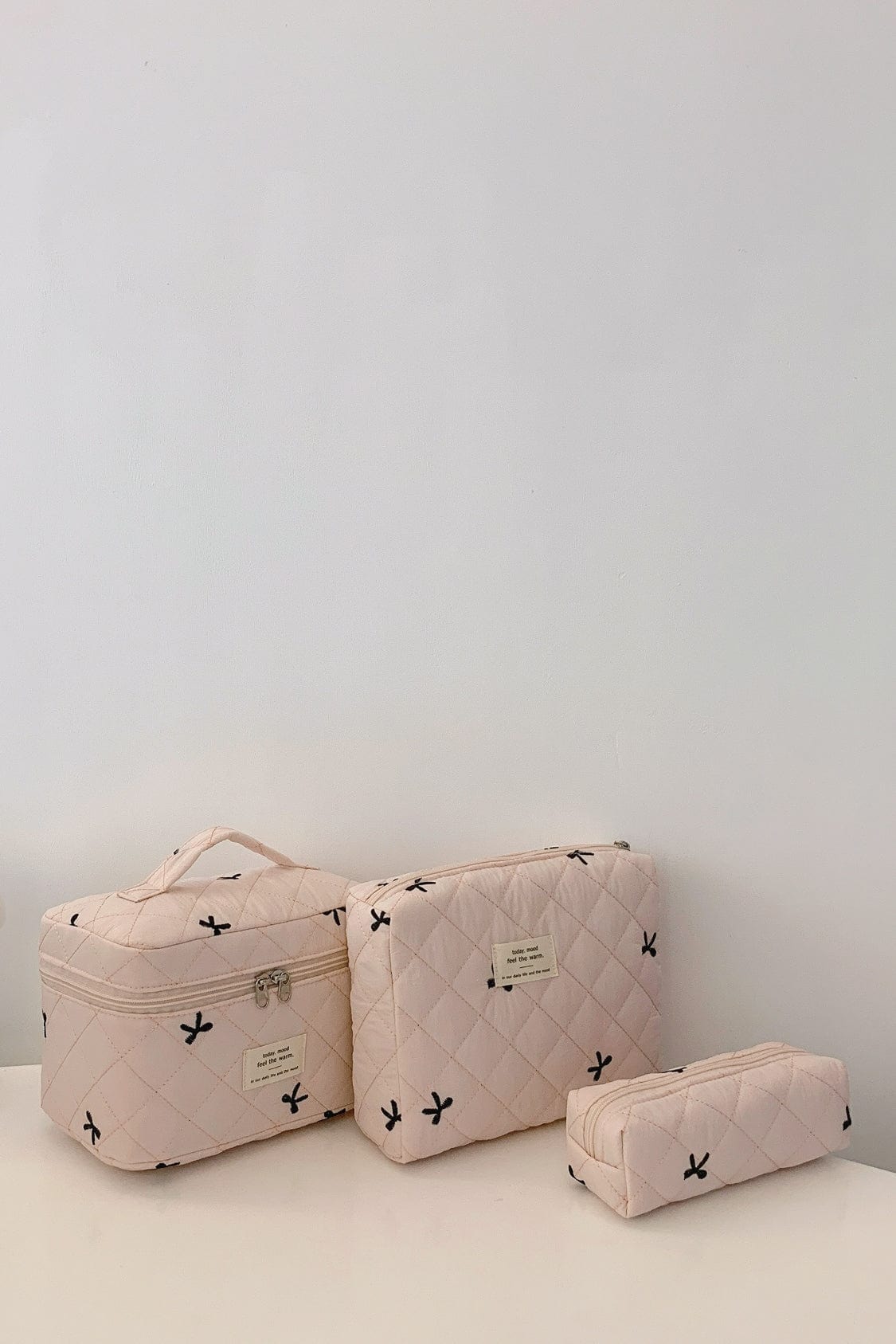 3 Piece Bow Quilted Cloth Storage Bag Set - Trendsi