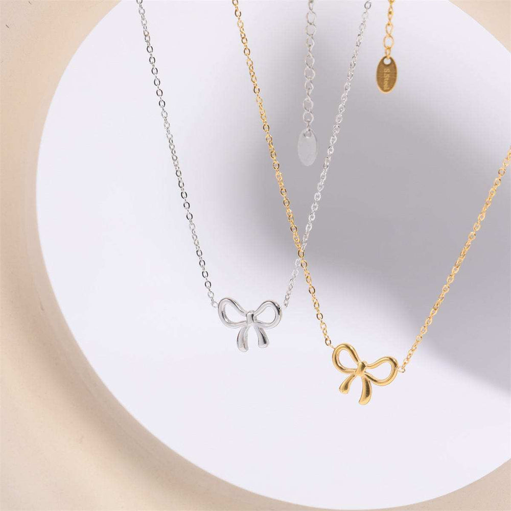 Titanium Steel Bow Pendant Necklace - Trendsi - Flyclothing LLC