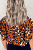 Leopard Notched Short Sleeve Blouse - Trendsi