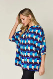 Double Take Full Size Geometric Notched Half Sleeve Blouse - Trendsi