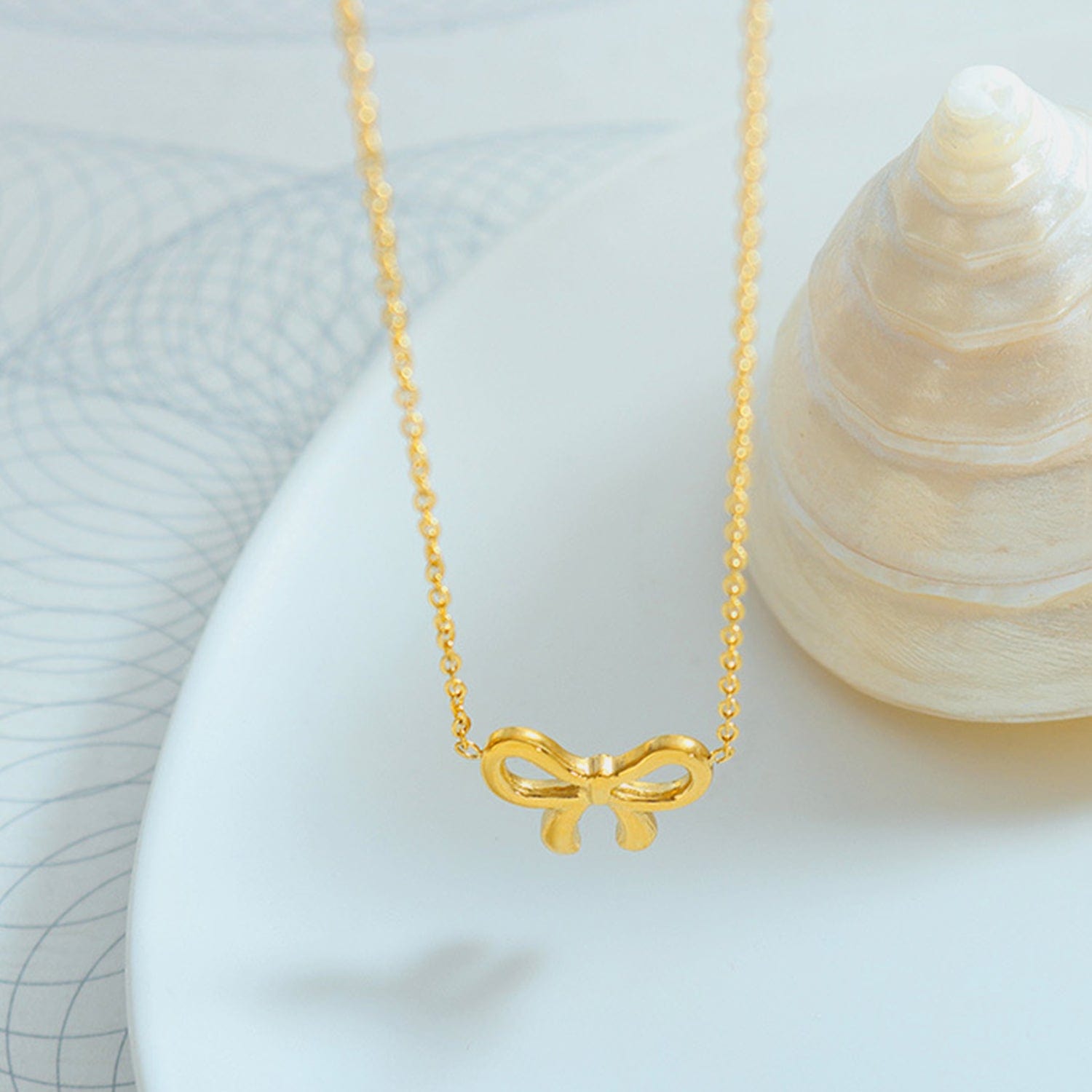 Gold-Plated Titanium Steel Bow Pendant Necklace - Trendsi