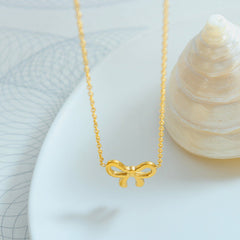 Gold-Plated Titanium Steel Bow Pendant Necklace - Trendsi
