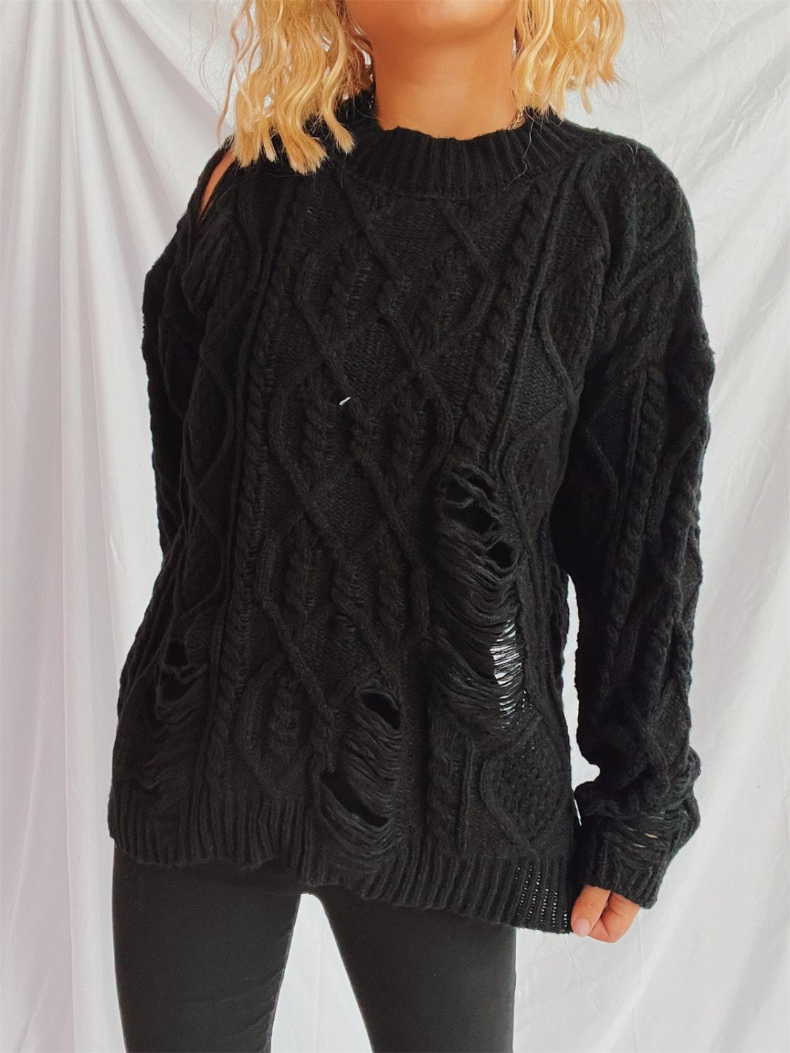 Distressed Cable-Knit Round Neck Long Sleeve Sweater - Trendsi