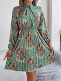Pleated Printed Tie Neck Long Sleeve Dress - Trendsi - Flyclothing LLC