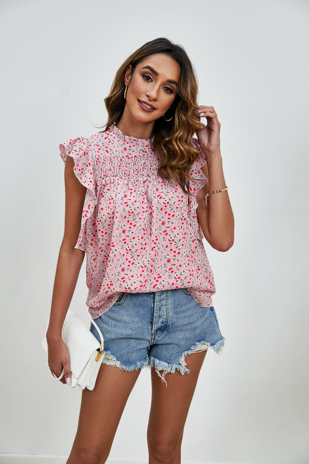 Ruffled Ditsy Floral Mock Neck Cap Sleeve Blouse - Trendsi