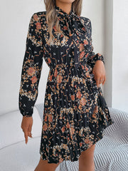 Pleated Printed Tie Neck Long Sleeve Dress - Trendsi