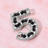 Rhinestone Rim Faux Leather Threaded Number Five Pin Brooch - Madeline Love - Flyclothing LLC