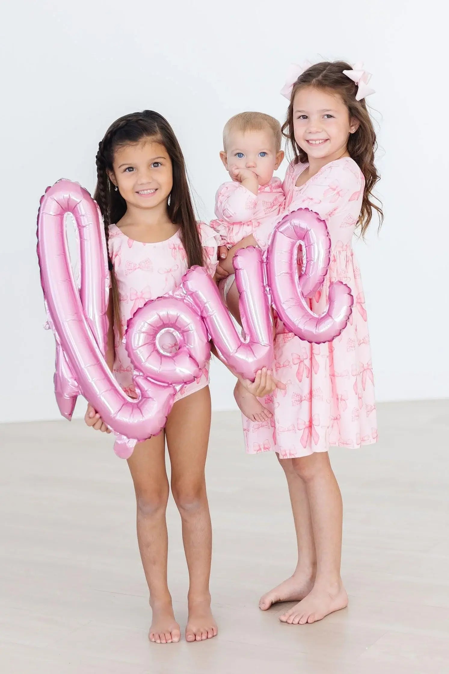 Blushing Bows 3/4 Sleeve Twirl Bodysuit - Mila & Rose ® - Flyclothing LLC