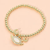 Stainless Steel Mother of Pearl CZ Stone Paved Crab Charm Beaded Stretch Bracelet - Madeline Love - Flyclothing LLC
