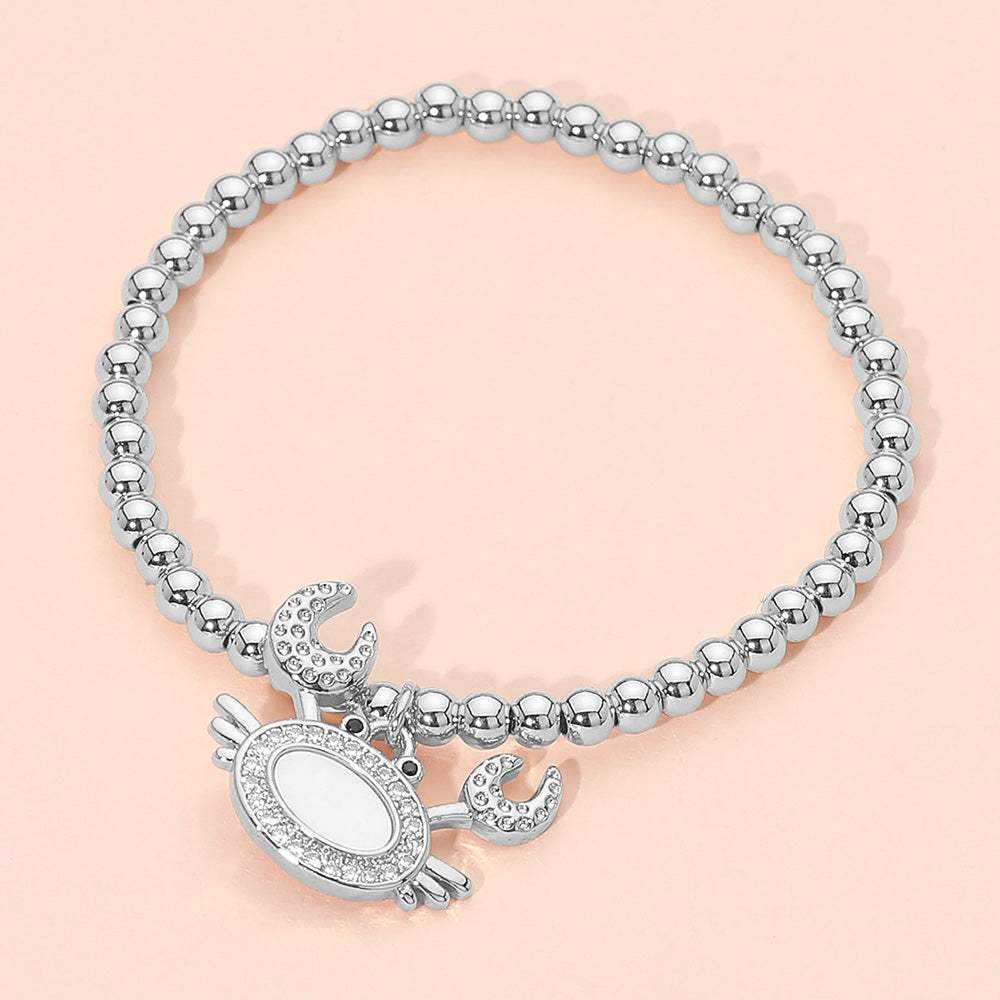 Stainless Steel Mother of Pearl CZ Stone Paved Crab Charm Beaded Stretch Bracelet - Madeline Love - Flyclothing LLC