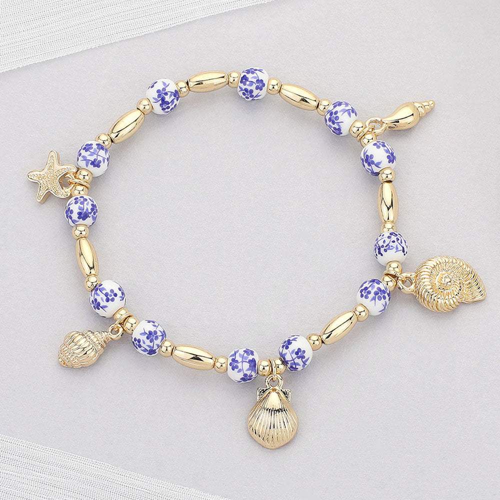 Metal Shell Puka Shell Starfish Charm Station Ceramic Ball Beaded Stretch Bracelet - Madeline Love - Flyclothing LLC