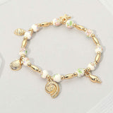 Metal Shell Puka Shell Starfish Charm Station Ceramic Ball Beaded Stretch Bracelet - Madeline Love - Flyclothing LLC