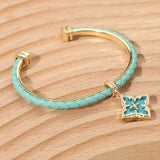 Floral Charm Accent Faux Leather Braided Cuff Bracelet - Madeline Love - Flyclothing LLC
