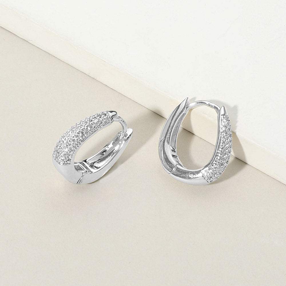 White Gold Dipped CZ Stone Paved Oval Huggie Hoop Earrings - Madeline Love - Flyclothing LLC