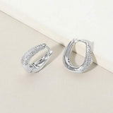 White Gold Dipped CZ Stone Paved Oval Huggie Hoop Earrings - Madeline Love - Flyclothing LLC