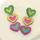 Glittered Resin Mardi Gras Triple Heart Link Dropdown Earrings - Madeline Love - Flyclothing LLC