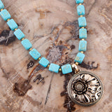 Flourished Golden Bronze Pendant Blue Turquoise Magnesite Necklace