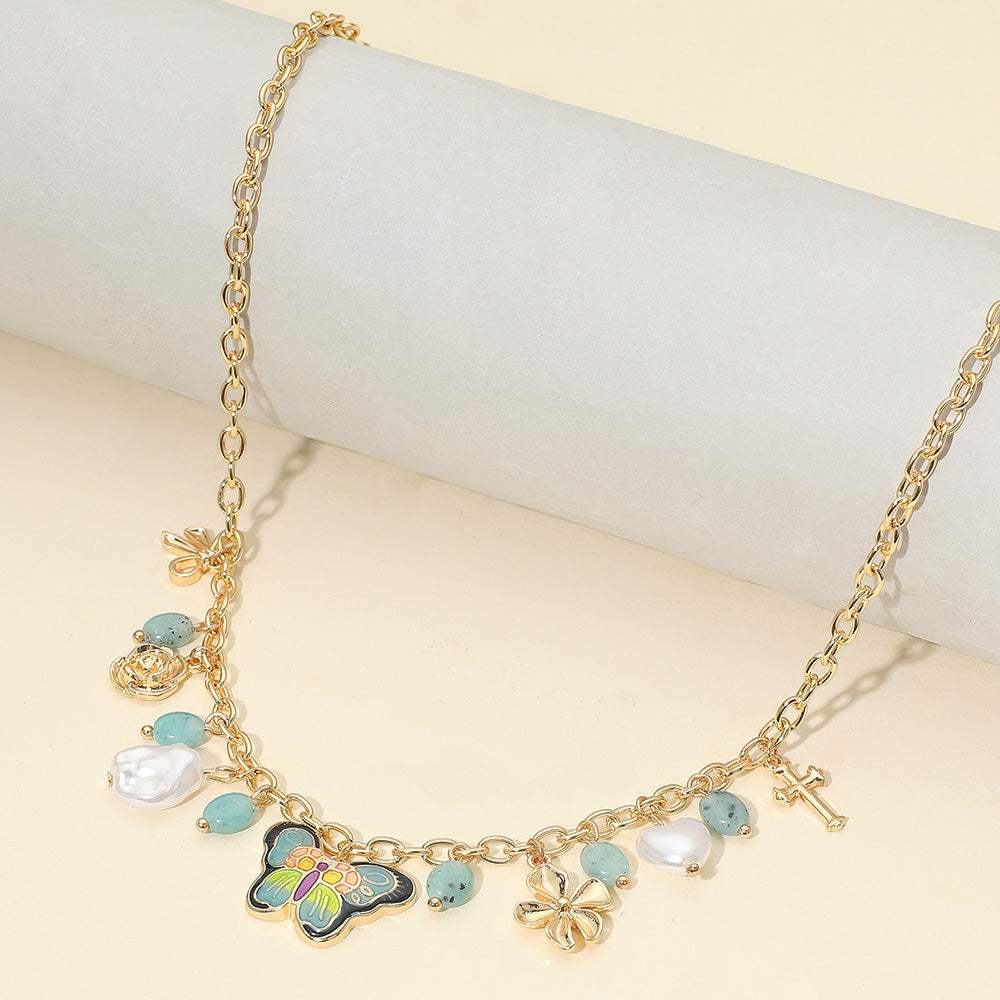 Enamel Butterfly Flower Cross Bow Heart Pearl Charm Station Necklace - Madeline Love - Flyclothing LLC