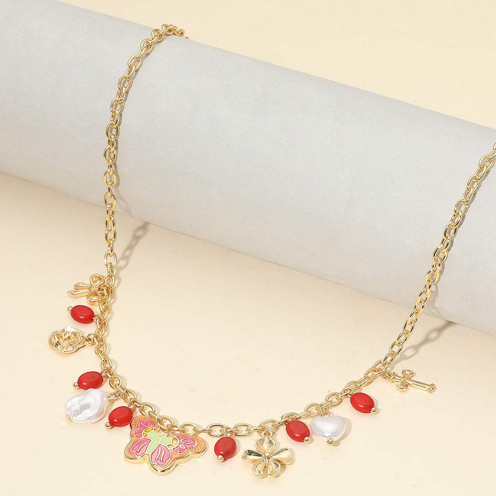 Enamel Butterfly Flower Cross Bow Heart Pearl Charm Station Necklace - Madeline Love - Flyclothing LLC