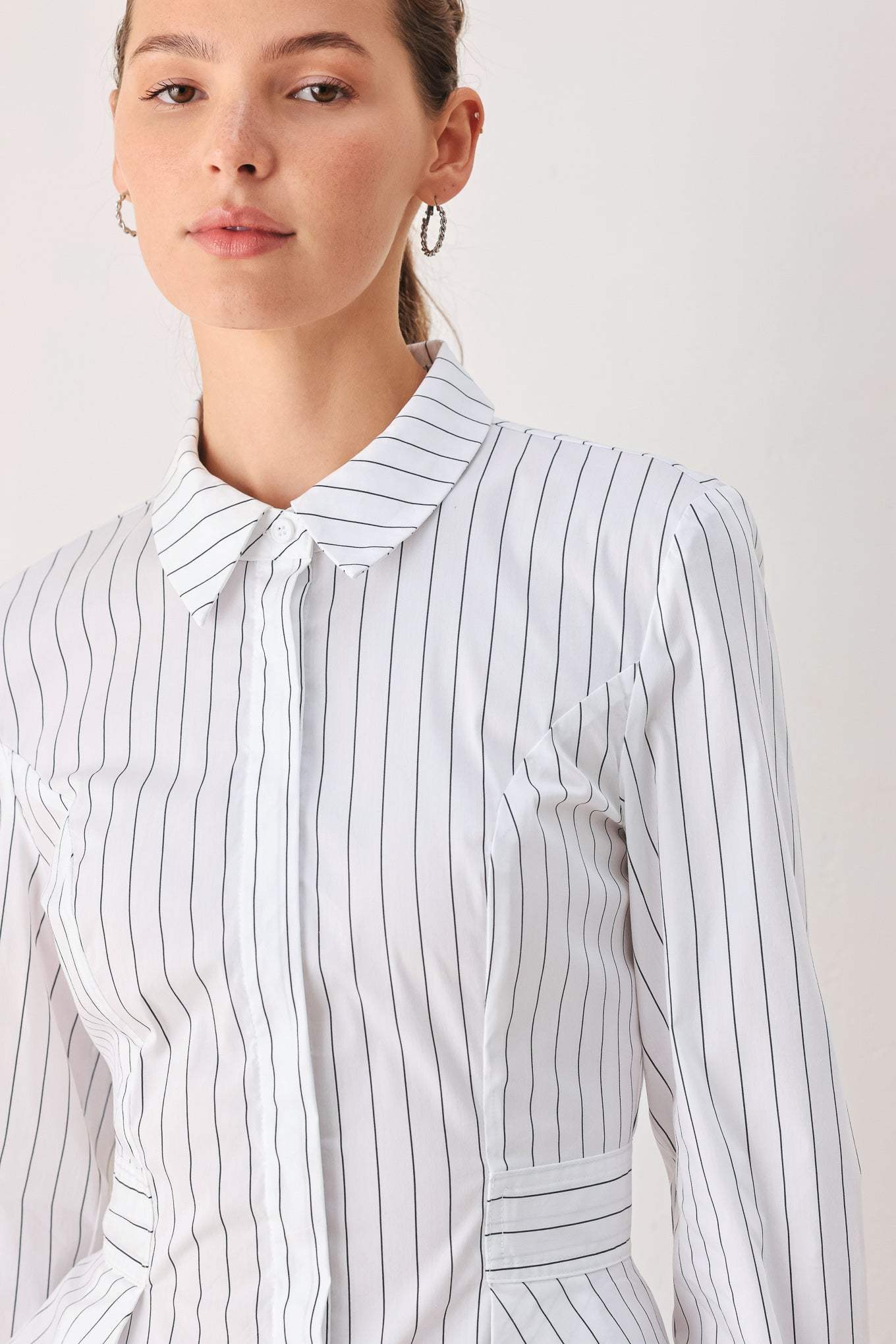 MODERNIST PINSTRIPE FLARED-WAIST WOVEN TOP