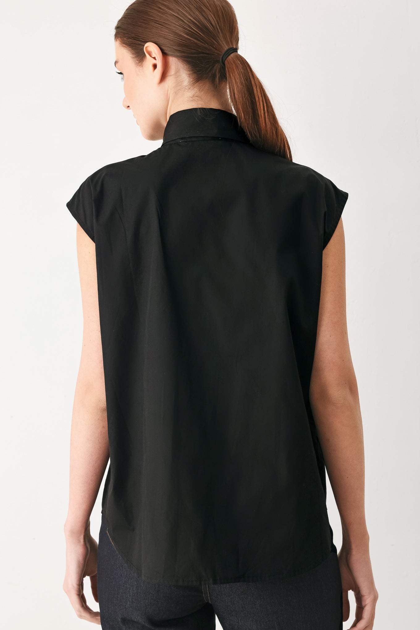 MODERN STATEMENT BOW WOVEN TOP