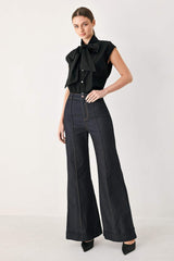 MODERN STATEMENT BOW WOVEN TOP