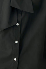 MODERN STATEMENT BOW WOVEN TOP