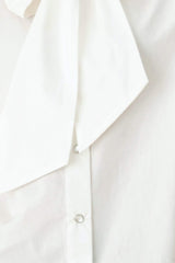 MODERN STATEMENT BOW WOVEN TOP