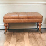 Buffalo Tan Leather Ottoman with Castor Legs - Artisan Furniture - Flyclothing LLC