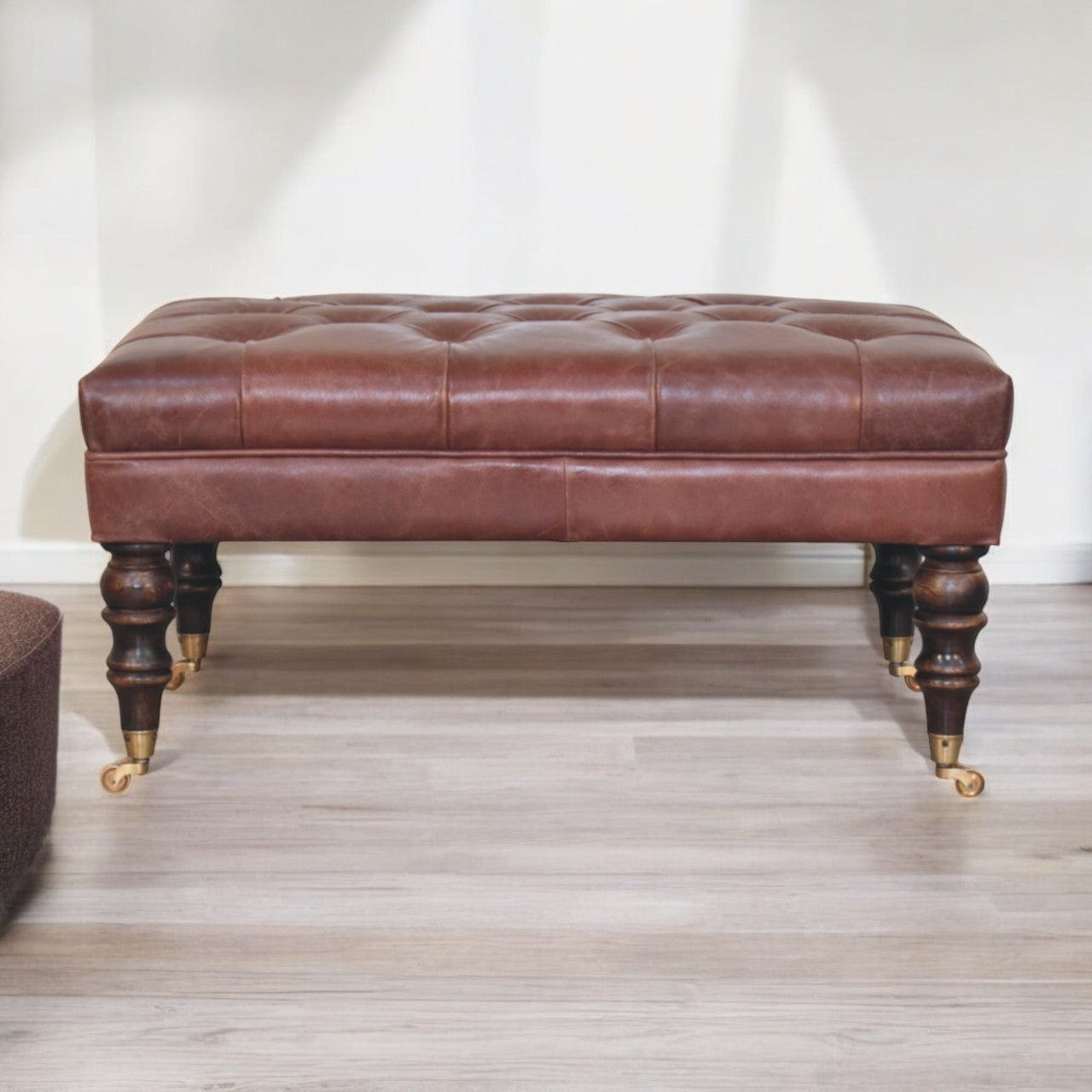 Buffalo Brown Leather Ottoman with Castor Legs