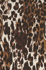 WILDLY POLISHED LEOPARD PEPLUM SWEATER TOP