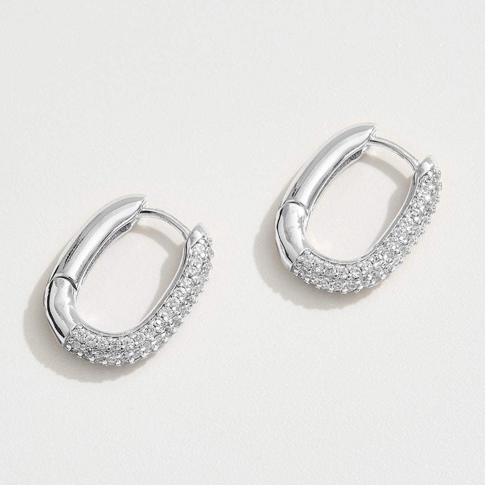White Gold Dipped CZ Stone Paved Oval Huggie Hoop Earrings - Madeline Love - Flyclothing LLC