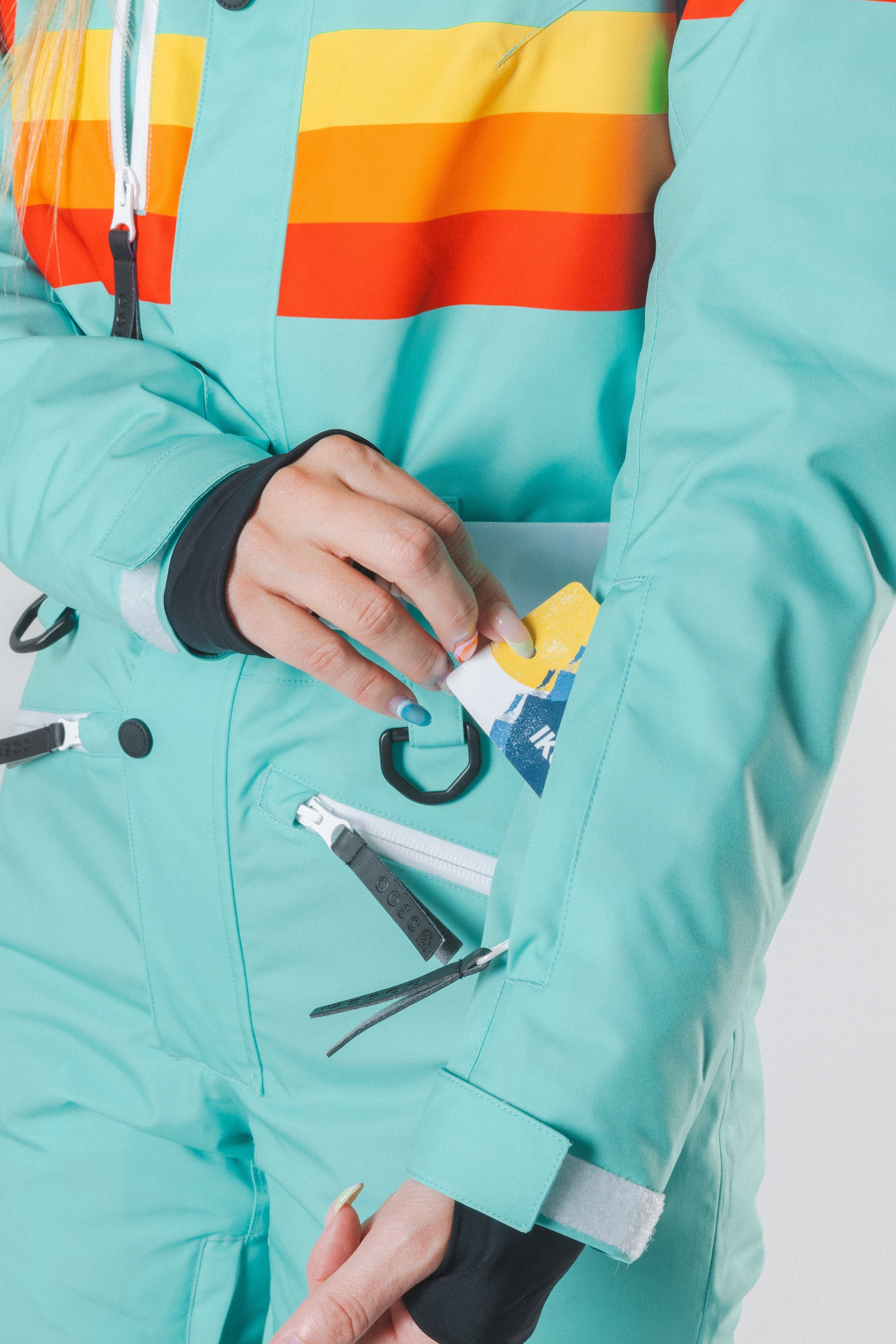 The Midday Aprés | Teal and Orange Retro Stripe Women's One Piece Ski Suit - Shinesty