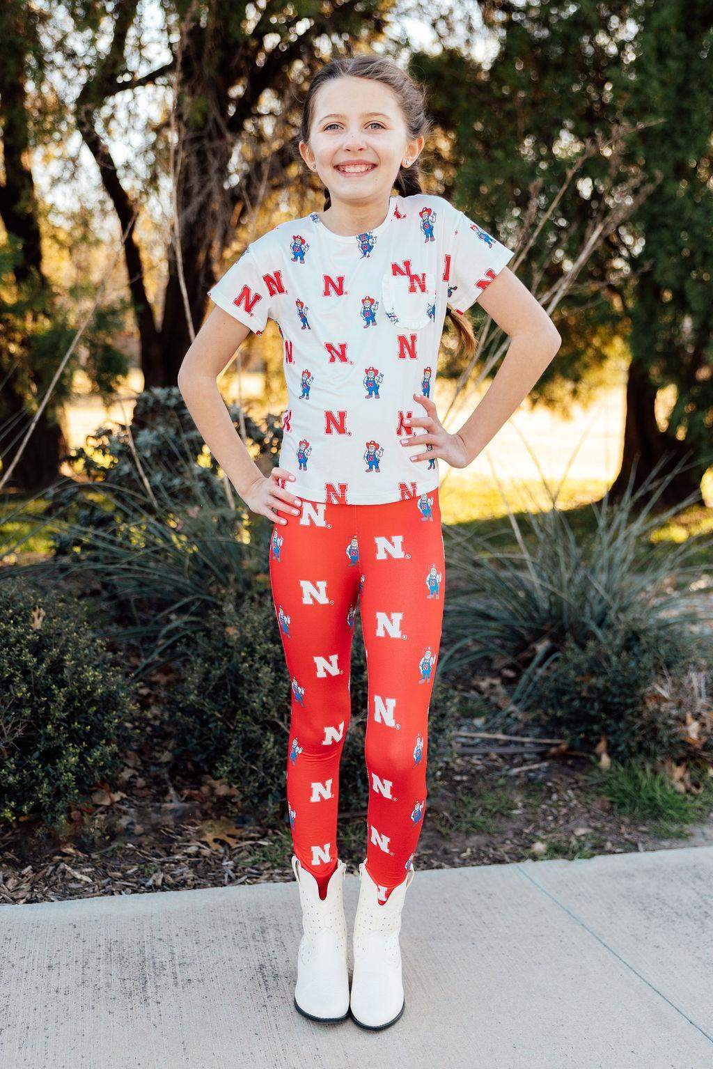 Nebraska White Herbie Husker Ruffle Pocket Tee - Mila & Rose ® - Flyclothing LLC