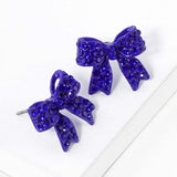 Pave bow stud earrings - Madeline Love - Flyclothing LLC