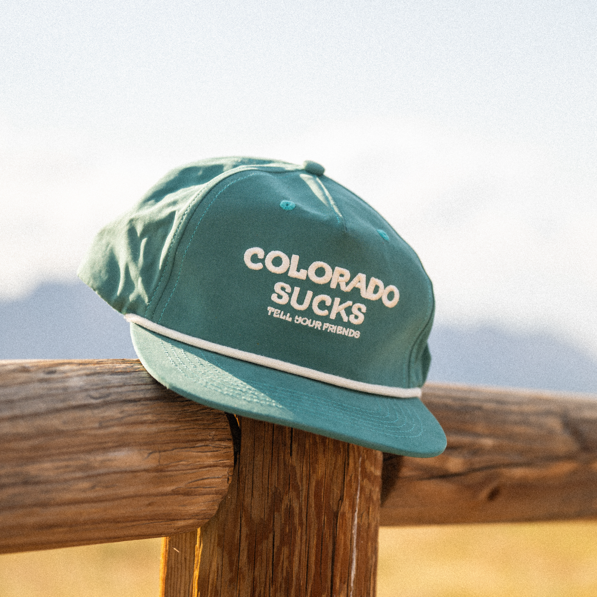 The Liar | Green Colorado Sucks Trucker Hat